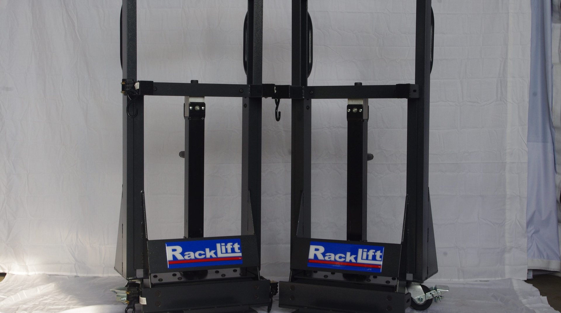 RackLift® RL3500S cabinet movers under a fully loaded server rack in a live data hall